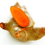 Turmeric root on white background